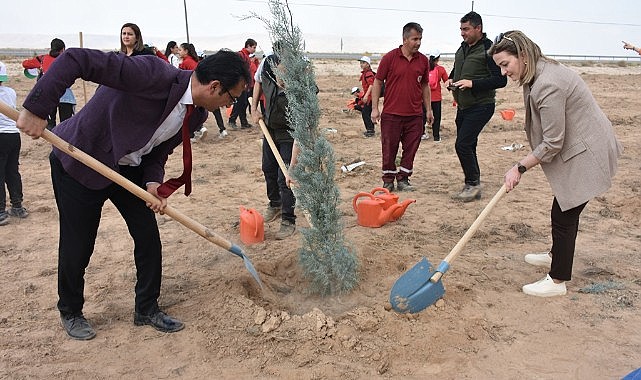 100 fidan toprakla buluştu