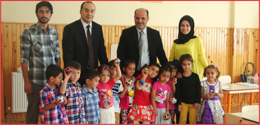 KAYMAKAM AMCADAN ÖĞRENCİLERE HEDİYE