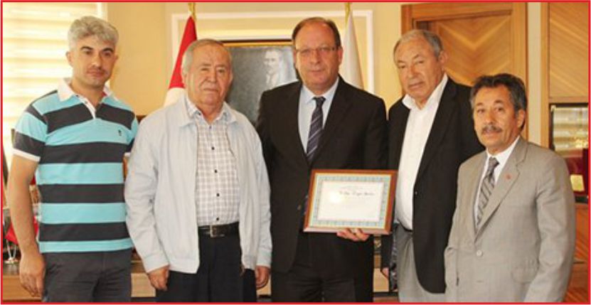 HUZUREVİNDEN OPRUKÇU’YA ONUR BELGESİ