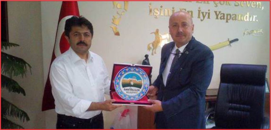 SAĞLAM’A PLAKET !